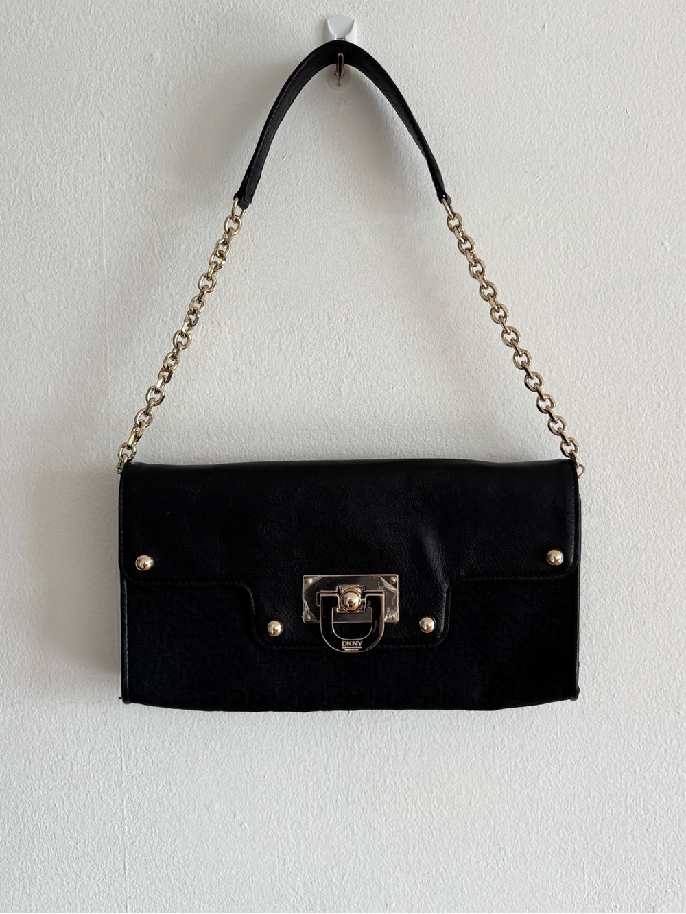 black faux leather monogram shoulder bag with gold hardware